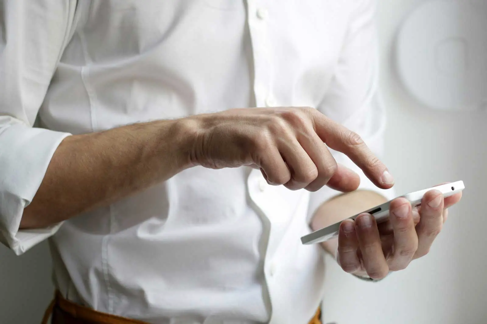 business man reading a text on his mobile phone